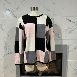 Woman’s button up sweater